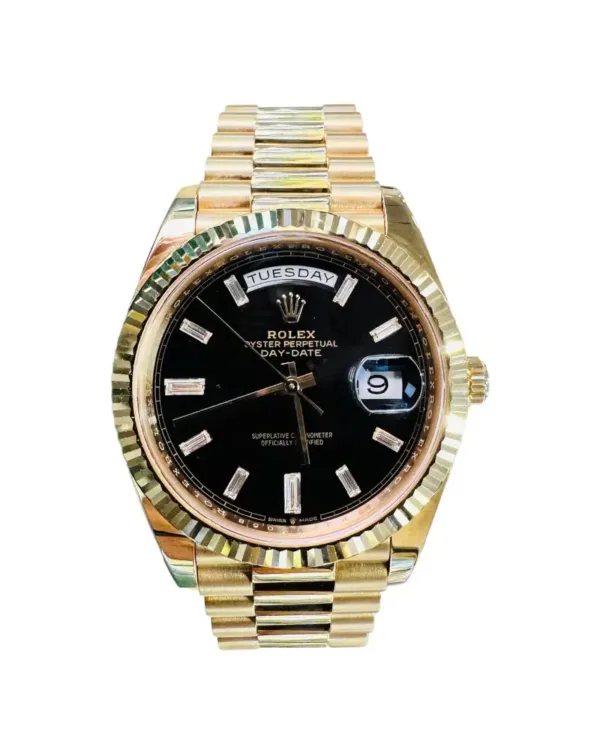 Rolex Day Date gold , baguette diamonds